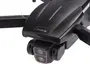 Nærbillede af sort drone med frontvendt kamera med to linser, foldbare arme og aerodynamisk design. Velegnet til luftfotografering og videooptagelse.