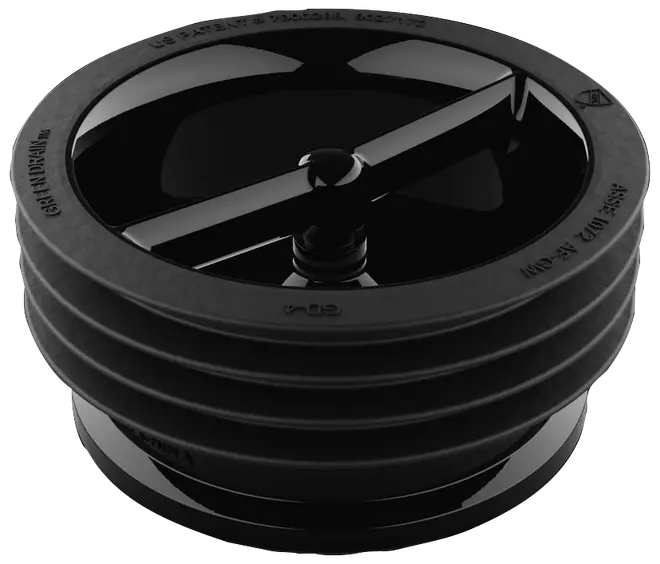 Sort plastafløbsdæksel med rund, rillet form og central tværstang. Designet til nem installation i gulvafløb for at forhindre snavs og lugt i at trænge ind.