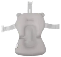 Ljusgrått nätbadstöd för bebis med huvudstöd, formad design och justerbara remmar. Andningsbart material ger komfort och säkerhet vid bad för spädbarn.