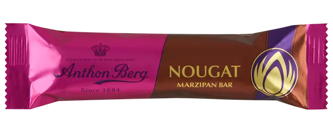 Anthon Berg nougat marcipanbar i pink og brun emballage med gulddetaljer.