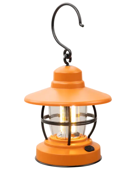 Orange LED campinglanterne med bred top, gennemsigtig cylinderformet krop, sort beskyttelsesbur, ophængskrog og tænd/sluk-knap i bunden. Velegnet til udendørs brug.