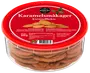 Runde karamelsmåkager i en klar plastbøtte med rødt låg. Mærkatet viser "Nordthy" og produktnavn på flere sprog. Nettovægt: 225g.