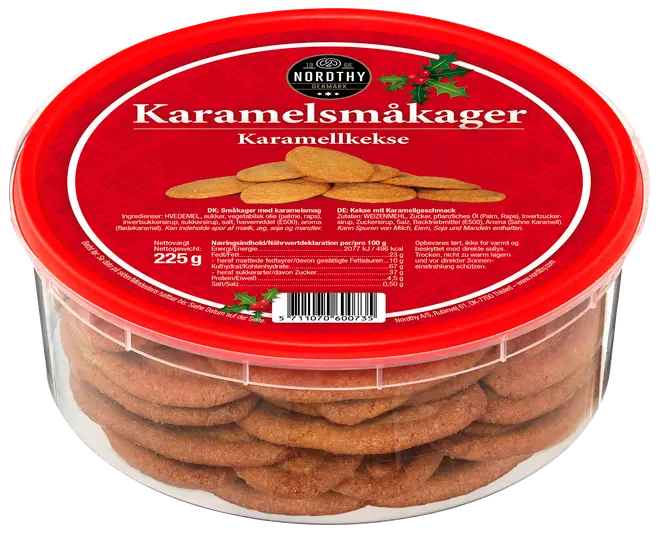 Runde karamelsmåkager i en klar plastbøtte med rødt låg. Mærkatet viser "Nordthy" og produktnavn på flere sprog. Nettovægt: 225g.
