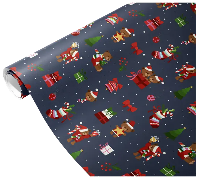 The image shows a roll of wrapping paper with a festive Christmas design. The background is dark blue and features a repeating pattern of teddy bears wearing Santa hats and scarves, Christmas trees, wrapped gifts in various colors, red bows, stockings filled with presents, holly sprigs, and snowflakes. The overall look is playful and colorful, suitable for holiday gift wrapping.