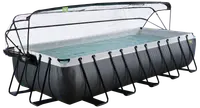 Rektangulær fritstående pool med solid sort ramme, grå ydre og gennemsigtigt låg. Fyldt med vand, egnet til svømning eller træning. Forstærkede hjørner og mange støtteben.