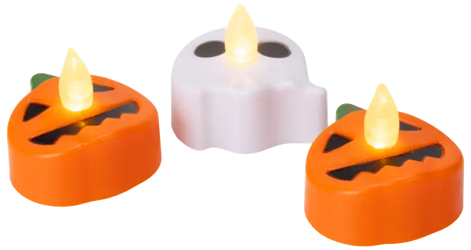 Set med tre LED-värmeljus: två orange pumpor med svarta ansikten, ett vitt spöke med svarta ögon, alla med lysande gula lågor.