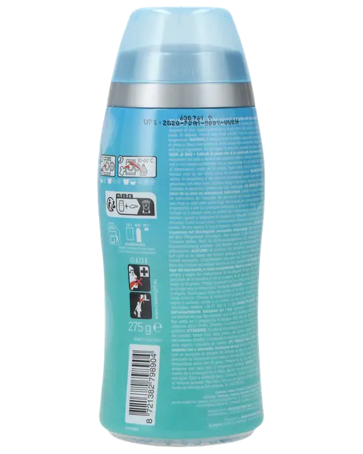 Blå aerosolbeholder med gennemsigtigt låg, sølvbånd og detaljerede instruktioner og advarsler på bagsiden. Indeholder 275g. Stregkode og piktogrammer for sikkerhed og brug.