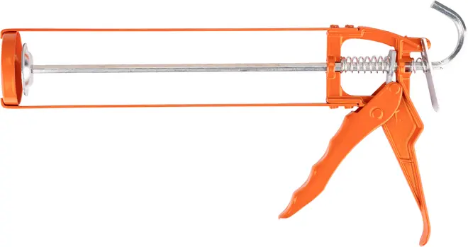 Orange fugepistol i metal med ergonomisk håndtag, udløsermekanisme og krog. Velegnet til standard patroner med fugemasse eller tætningsmiddel for præcis påføring.