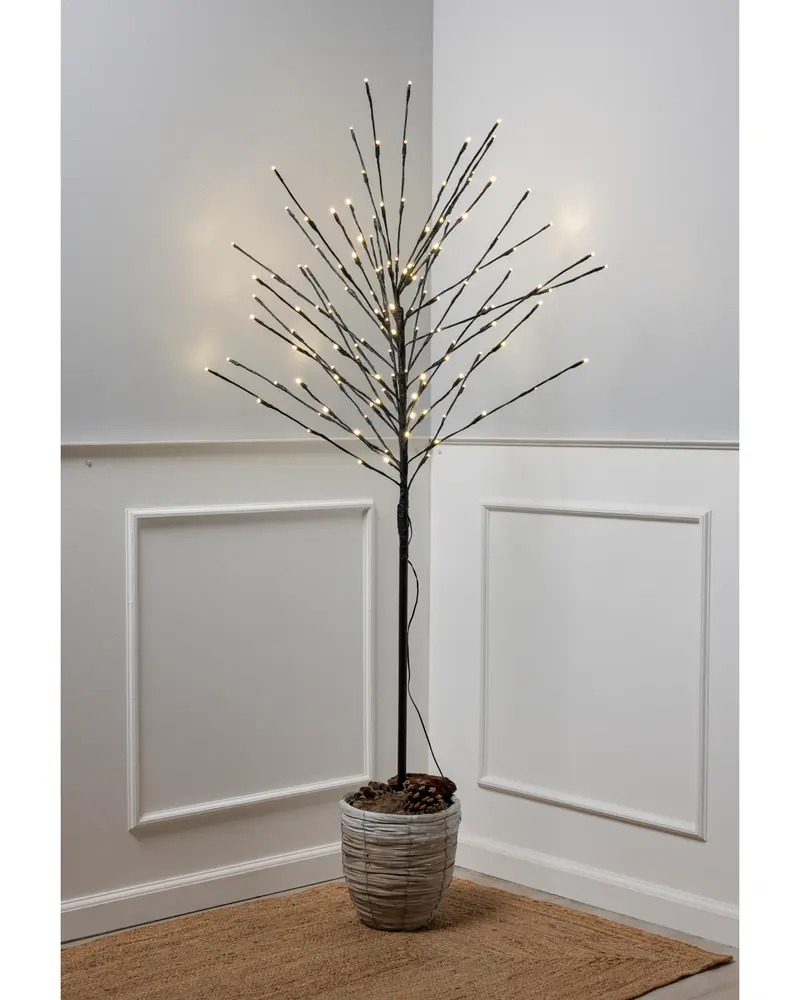 Tall decorative tree with slender black branches, each tipped with small warm white LED lights. The tree is placed in a textured, light gray pot filled with pinecones. The design is minimalist and modern, suitable for indoor use as accent lighting or seasonal decoration.
