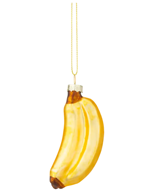 Julepynt i glas formet som en gul banan med brune ender, guldfarvet ophæng og blank overflade. Realistiske detaljer, let at hænge på træet.