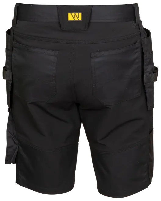 Sorte arbejdsshorts med forstærkede syninger, to baglommer, værktøjsstropper på siderne og bred linning med gul logomærke. Slidstærkt materiale til krævende opgaver.