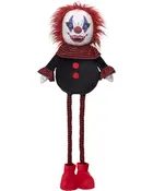 Uhyggelig Halloween-klovnefigur med rødt krøllet hår, hvidt ansigt, stribet krave, sort dragt, lange stribede ben og store røde sko.
