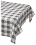 Rektangulär bordsduk i tyg med svartvitt rutmönster. Täckande design som passar till matbord eller köksbord. Klassisk och tydlig stil.