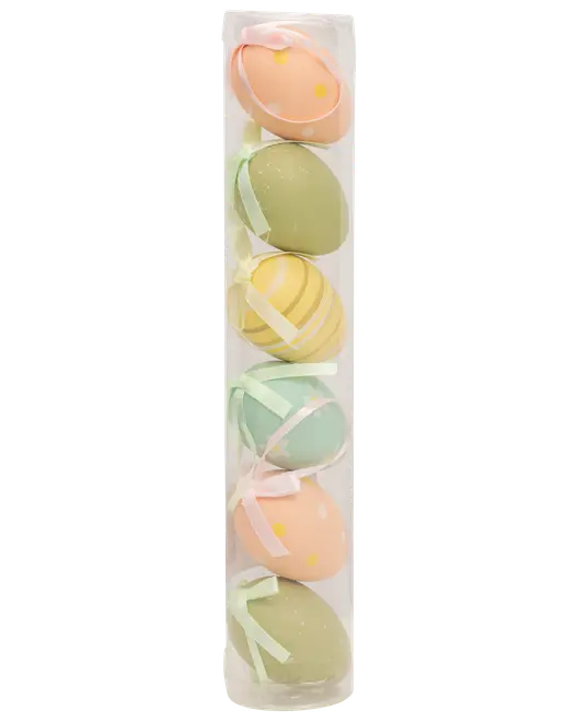 Set med sex dekorativa påskägg i pastellfärger med band, prickar och ränder, förpackade i ett genomskinligt plastfodral. Perfekt för upphängning eller dekoration.