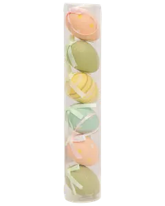 Sæt med seks dekorative påskeæg i pastelfarver med bånd, prikker og striber, pakket i et klart plastikrør. Perfekt til ophæng eller bordpynt.