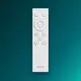 Hvid Philips fjernbetjening med flere runde knapper til strøm, lysstyrke og tilstand. Elegant, minimalistisk design, velegnet til belysning eller smart home-enheder.