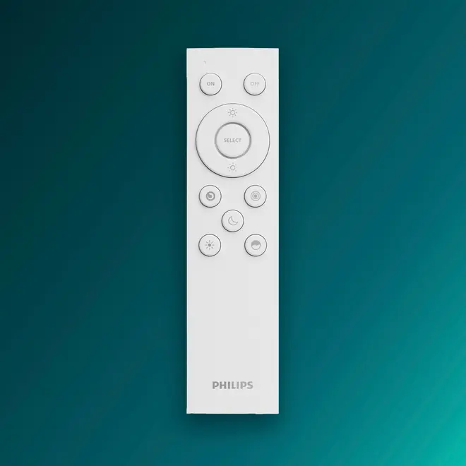 Hvid Philips fjernbetjening med flere runde knapper til strøm, lysstyrke og tilstand. Elegant, minimalistisk design, velegnet til belysning eller smart home-enheder.