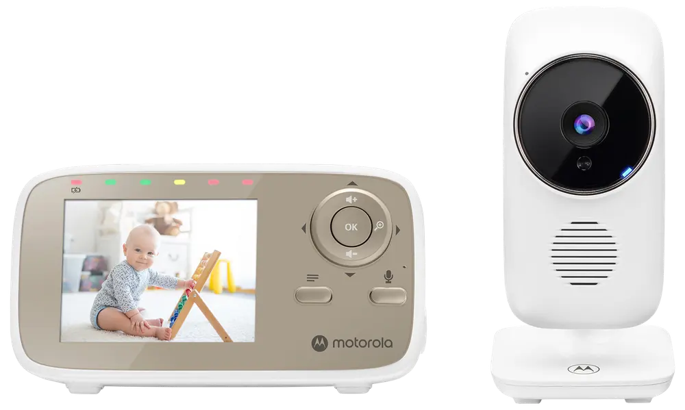 Motorola babyvakt med vit kamera och handhållen skärmenhet. Skärmen visar en baby, och enheten har navigeringsknappar och indikatorlampor.
