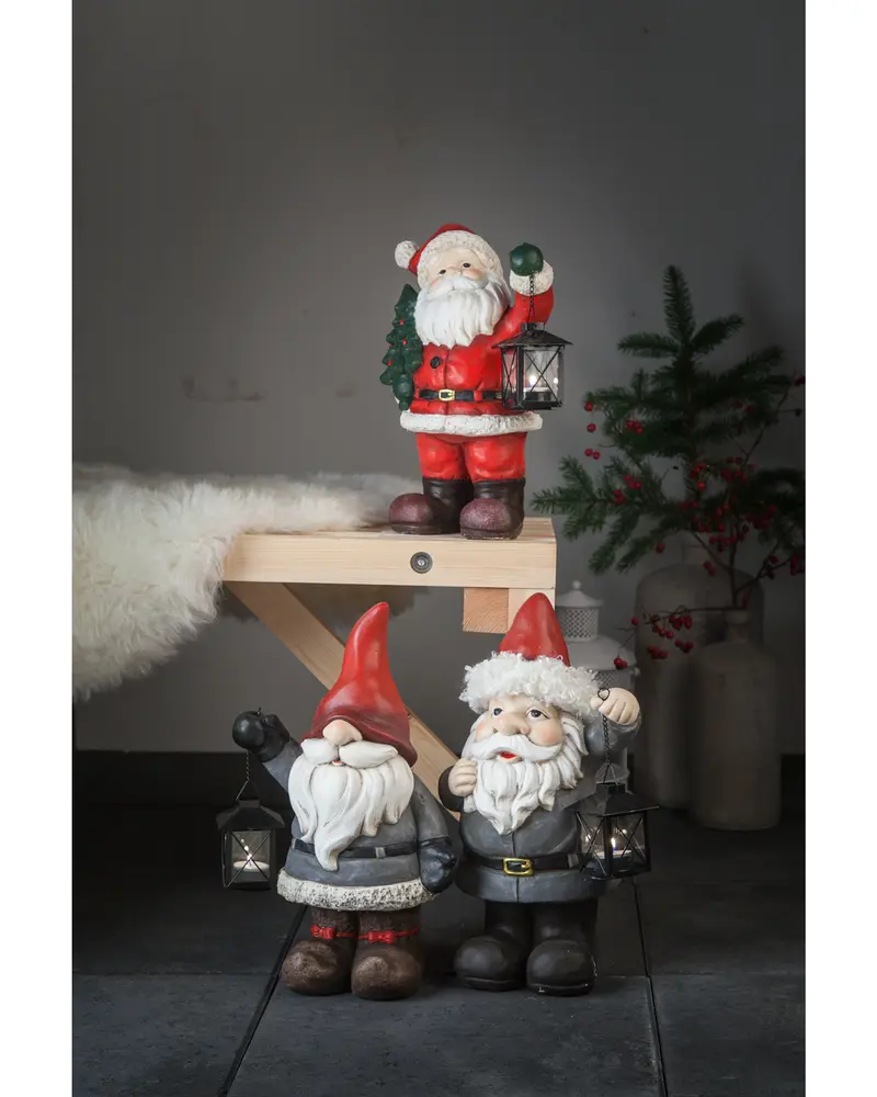 Jultomte med gran och lanterna