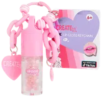 Lyserød lipgloss-nøglering med kraftig kæde, hjertevedhæng og glitrende gloss. Inkluderer emballage med hjertedesign, egnet til børn fra 6 år. Kompakt og bærbar.