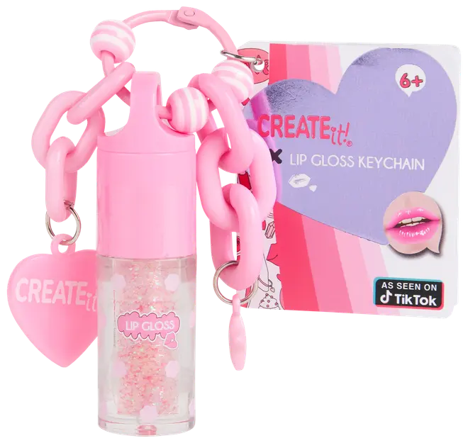 Lyserød lipgloss-nøglering med kraftig kæde, hjertevedhæng og glitrende gloss. Inkluderer emballage med hjertedesign, egnet til børn fra 6 år. Kompakt og bærbar.