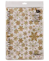 Plastduk, 130x180 cm, med festligt guldigt snöflingemönster på vit bakgrund. Passar till vinter- eller högtidsdukning. Förpackad i genomskinlig plastpåse.