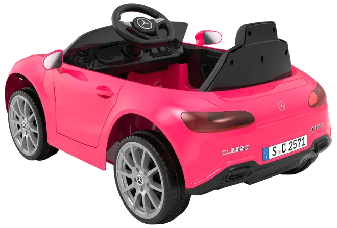 Lyserød elbil til børn, Mercedes-Benz design, detaljerede hjul, rat, bagspoiler og realistiske baglygter. Åben sportsvognsmodel, egnet til små børn.