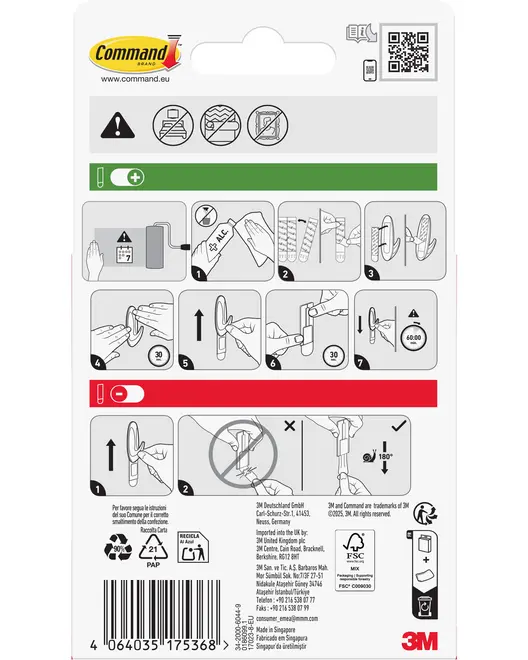 Bagside af Command klæbekrog emballage med trin-for-trin illustrationer til montering og fjernelse, sikkerhedsadvarsler og produktinformation. Egnet til glatte overflader, ikke til tapet eller ru vægge.