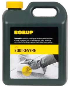 Sort plastdunk med gult låg, mærket 'Borup 32% Eddikesyre.' Anvendes til afkalkning og rengøring. Har bærehåndtag og tydelig brugsanvisning på etiketten.