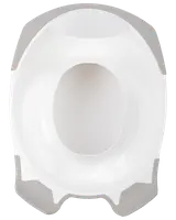 Hvid plastik toiletsæde til børn med grå skridsikre kanter. Ergonomisk form, passer til standardtoiletter og giver komfort og stabilitet under pottetræning.