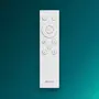 Hvid Philips fjernbetjening med flere runde knapper, inklusive ON/OFF, vælg og forskellige funktionsikoner. Elegant, minimalistisk design til belysning eller smart home-enheder.
