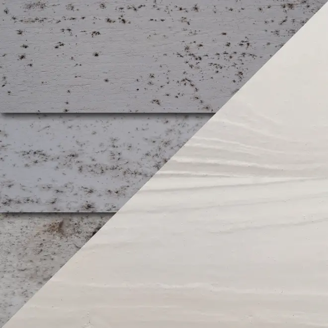 Sammenligning af udendørs facadepaneler: øverste halvdel viser snavsede, mugne paneler; nederste halvdel viser rene, hvide paneler, hvilket fremhæver effektiviteten af et rengøringsprodukt.