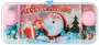 Handhållet vattenringsspel med jultema, visar jultomte, paket och granar. Transparent hölje, rosa tassknappar, färgglada ringar inuti för spel.
