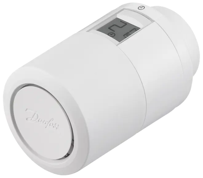 Hvid elektronisk radiator-termostat med digitalt display, cylindrisk form, Danfoss-logo, designet til præcis temperaturstyring og energieffektivitet i hjemmets varmesystemer.