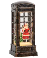 Jultomte i telefonkiosk 
