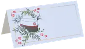 Foldet bordkort med studenterhue, grønne blade og små dannebrogsflag. Hvid baggrund med guldkant og tomt felt til navn eller besked.
