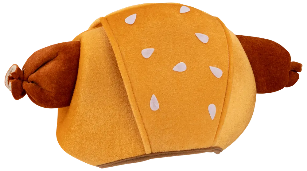 Mjukdjur formad som en hamburgare med brun bulle, vita sesamfrön och två stoppade kycklingben. Mjukt tyg, passar för mys eller dekoration.