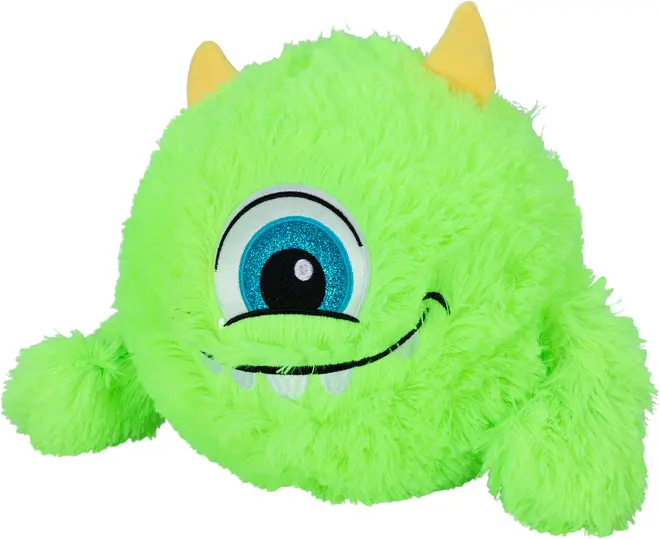 Lysende grøn plysbamse formet som et rundt monster med ét stort blåt øje, smilende mund med hvide tænder, to gule horn og blød, fluffy tekstur.