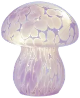 Svampeformet glaslampe med blank, gennemsigtig overflade. Har et blødt lilla og hvidt plettet mønster, hvilket giver et eventyrligt og moderne dekorativt lys til ethvert rum.
