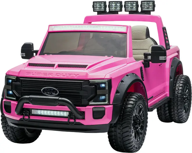 Lyserød elbil til børn, formet som en pickup truck med sorte detaljer, store dæk, LED-lys på tag og kofanger, sidespejle og realistisk interiør. Minder om en Ford Super Duty.