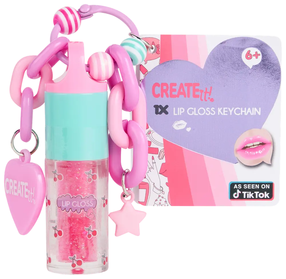 Læbepomade-nøglering med pink og turkis låg, kirsebærmotiv, kraftig pink kæde, hjerte- og stjernevedhæng. Inkluderer emballage til 6+, mærket "Create It!"