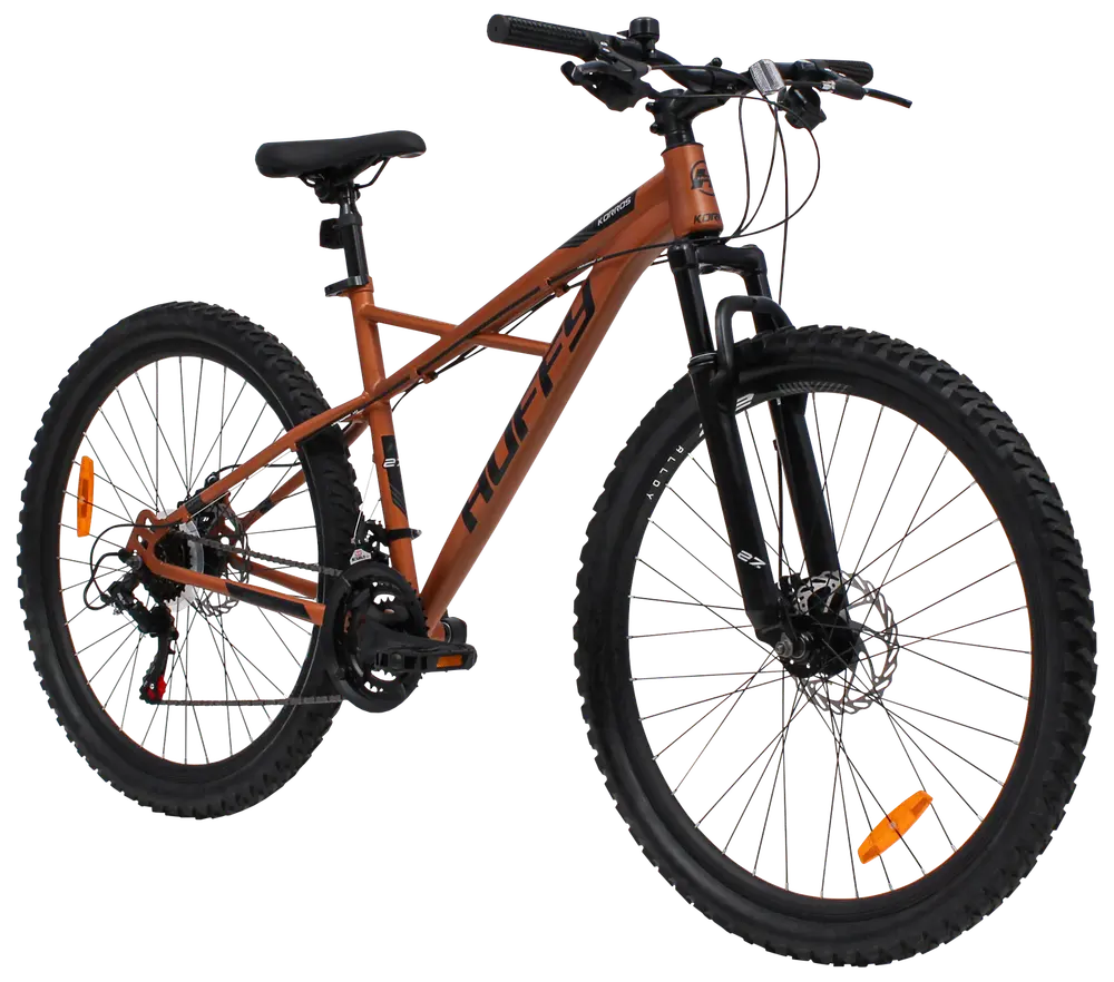 Brun mountainbike med framdämpning, grova däck, skivbromsar och flera växlar. Stabil ram, justerbar sadel och ergonomiskt styre för terrängcykling.