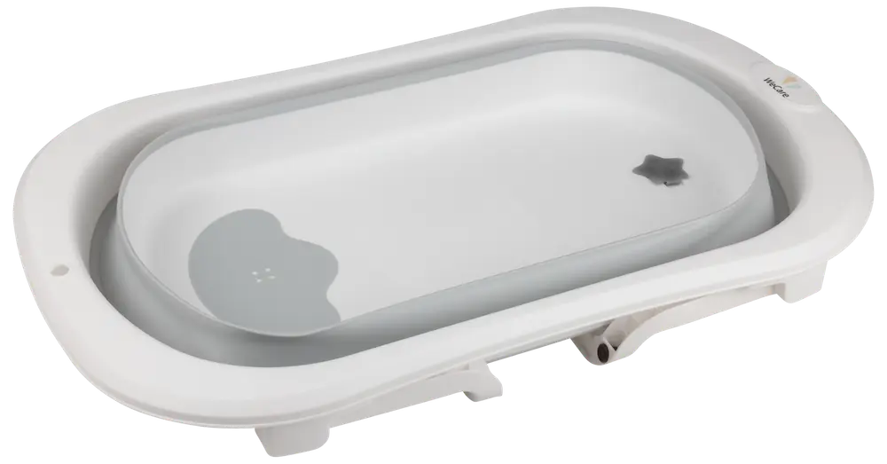 Hopfällbart babybadkar i vitt och grått med halkfri botten, integrerad avtappningsplugg och ergonomisk design. Passar för spädbarn och småbarn.