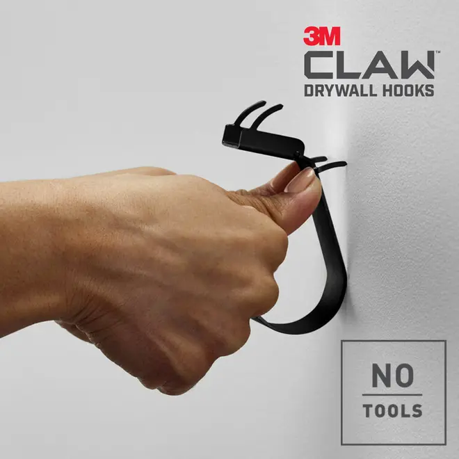 3M Claw gipskrog, sort, installeres med hånden i væggen. Ingen værktøj kræves. Holdbar metal konstruktion, buet krog design til sikker ophængning på gipsvægge.