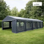 Gråt stort partytelt på græsplæne