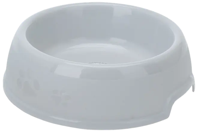 Vit keramikskål för husdjur med slät, blank yta och diskreta präglade tassavtryck på sidan. Rundade kanter och bred botten för stabilitet.