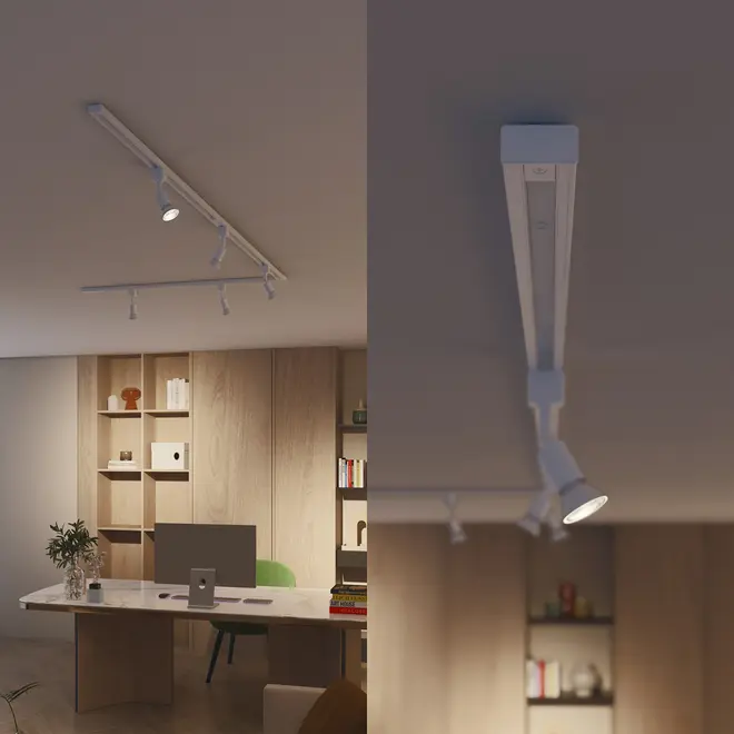 Hvidt loftmonteret skinnesystem med tre justerbare spotlys. Moderne design, giver retningsbestemt belysning, ideel til kontorer, stuer eller arbejdsområder.