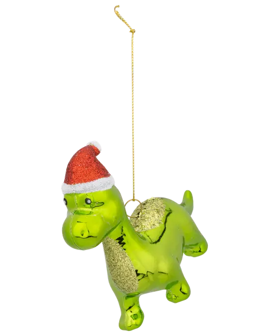 Grønt dinosaur-juleophæng med glitrende gulddetaljer og rød-hvid nissehue. Har en gylden snor til ophængning på juletræet.