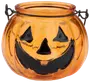 Orange glasbeholder formet som et græskar med sort græskarmaske, metalhank og bred åbning. Perfekt til Halloween dekoration eller slikskål.