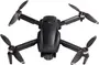 Sort quadcopter-drone med fire foldbare propelarme, indbygget kamera foran og slankt, kompakt design. Velegnet til luftfotografering og rekreativ flyvning.